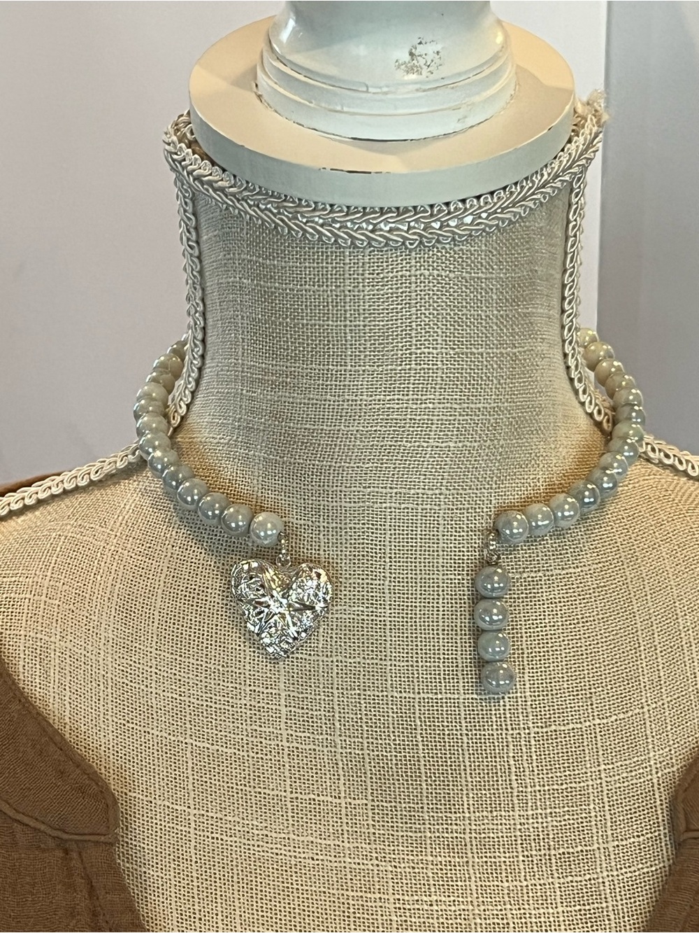 Elegant Beaded Necklace with Silver Heart Pendant